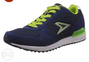Blue, White, And Green Low-top Running Shoe