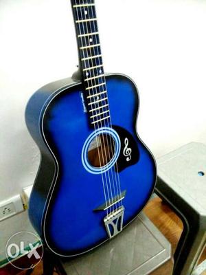 Blue and black acoustic guitar 8..1, this