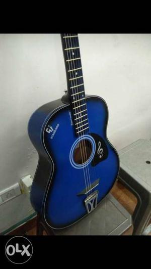 Blue and black pure acoustic guitar 8..1,