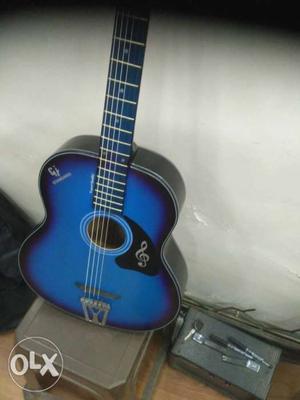 Blue hollow acoustic guitar 8..1, amazing