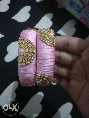 Pink And Gold-colored Thread Bangles