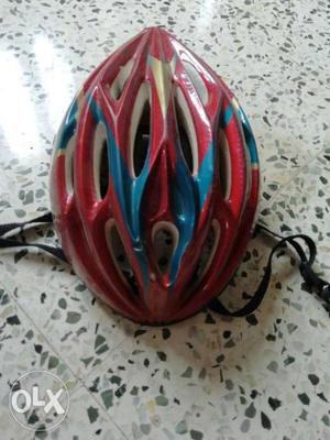 Red And Blue Bicycle Helmet