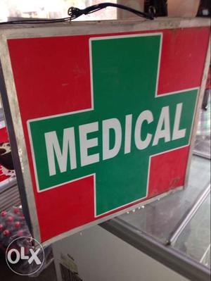 Red And Green Cross Medical Signage