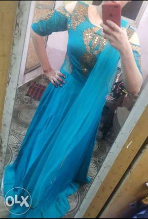 Royal Sea Blue Gown with Golden work.