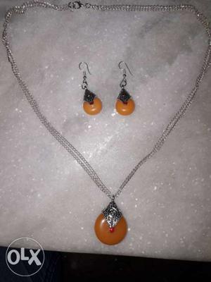 Silver-colored Chain Necklace And Orange Pendant