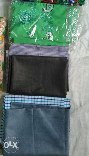 Black, Gray, And Green Textiles