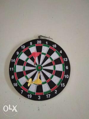 Black, Red, And Green Dartboard