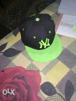 Green color cap with good condition 1 month