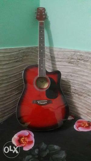 Guitar.. 3 month old, good condition with belt, beg,stings