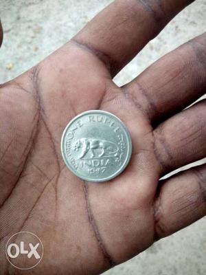I have a 1 Rupee coin, which belongs to 