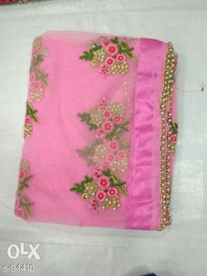Pink, Green, And Beige Floral Textile