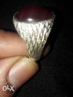 Silver-colored Ring With Maroon Gemstone