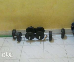 Two Black Dumbbells And Barbells