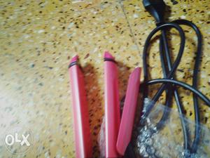 Two Pink And Black Hair Curlers