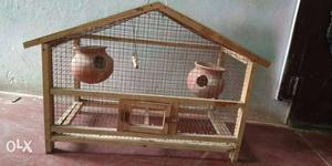 Cage for birds. One year old. No damage. With two