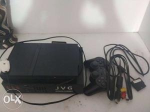 Ps2 console with rasila and 47 games and 1