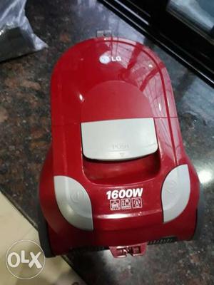 Red And White LG Canister Vacuum Cleaner