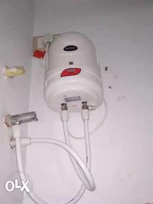 White And Red Canister Vacuum Cleaner