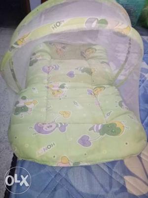 Baby bed with mosquito saver net