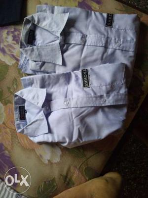 Baby's White And Gray Carrier