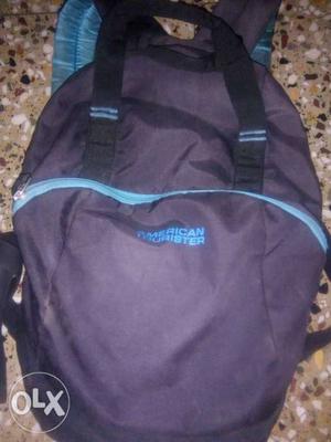 Black And Blue American Tourister Backpack