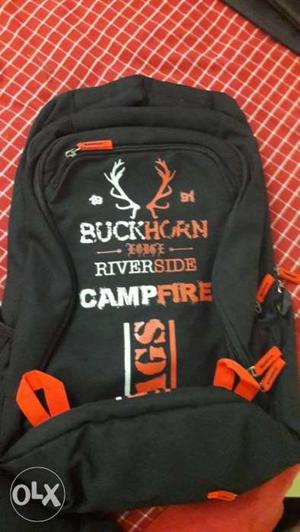 Black And Orange Buckhorn Campfire Backpack