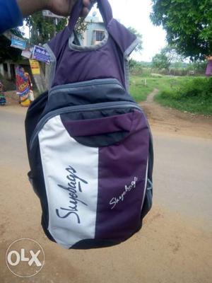Black, Purple, And White Backpack