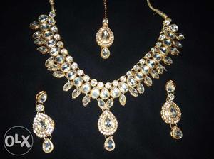 Gold-colored And White Pearl Necklace And Earrings