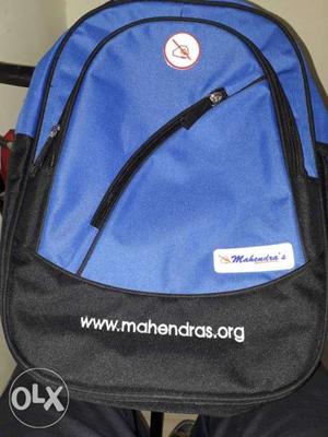 Mahindra bag and books