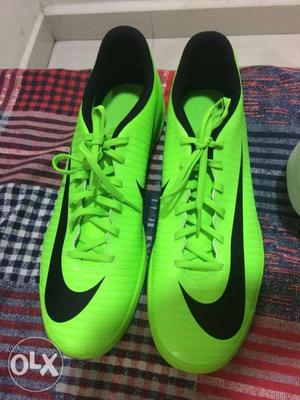 Pair Of Green Nike Cleats