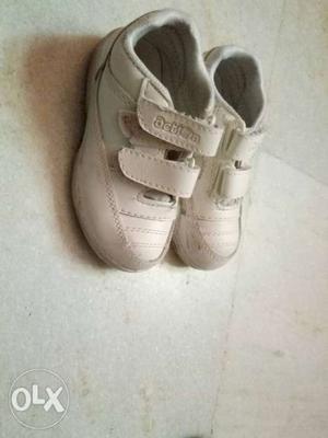 Pair Of White Velcro Shoes