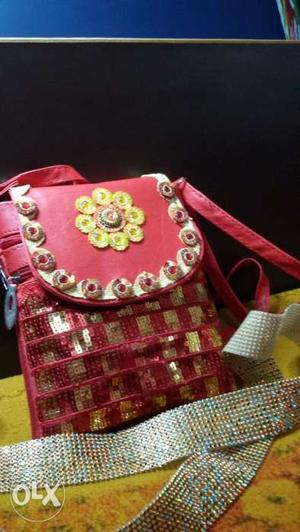 Red colour stylish handmade bag