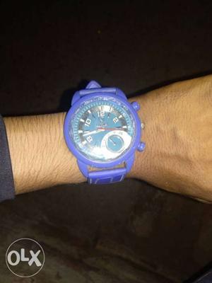 Round Blue Chronograph Watch With Purple Strap