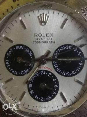 Round Gray Rolex Chronograph Watch