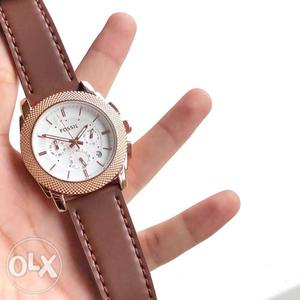 Round Silver Chronograph Watch With Brown Leather Strap