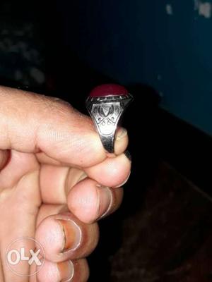 Silver-colored Ring With Red Gemstone