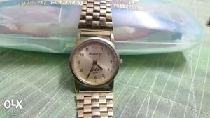 Sonata gold wrist watch