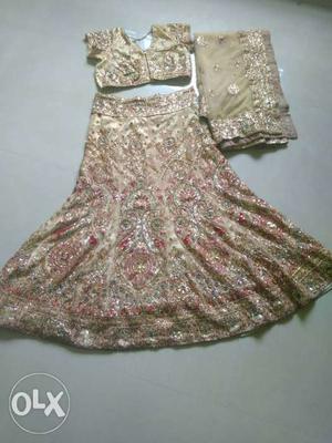 Two woman's chanya choli (1)golden,(2)pink with best