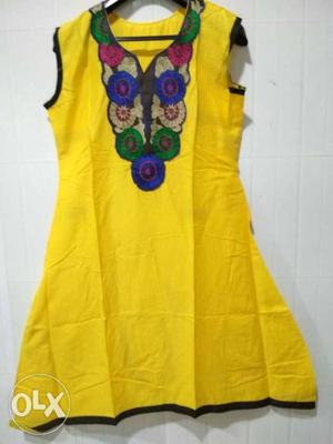 Yellow And Blue floral embroidered kurti