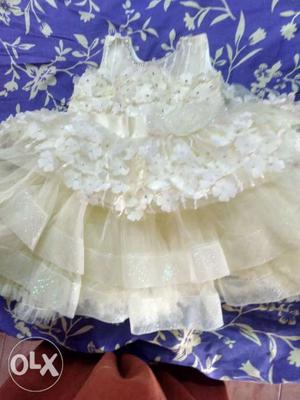 Baby frock size 18 only one time used for first