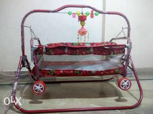 Baby's Red And White Portable Swing