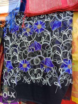 Black, White, And Purple Floral Textile