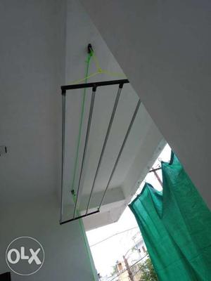 Cloth drying hanger with installation