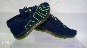 Pair Of Blue-and-green Nike Running Shoes