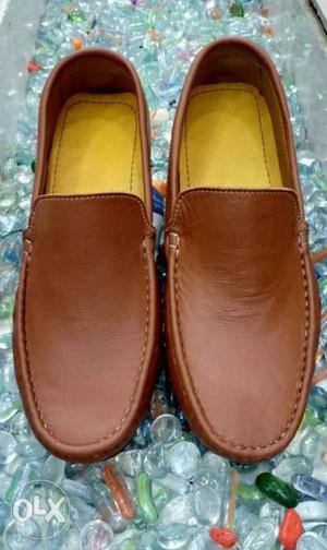 Pair Of Brown and Black Leather Loafers