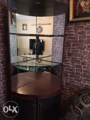 Wooden corner showcase with mirror