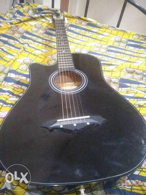 Absolutely new guitar with extra strings,