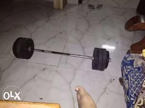 Black And Gray Barbell and dumbells with 8 plates and one