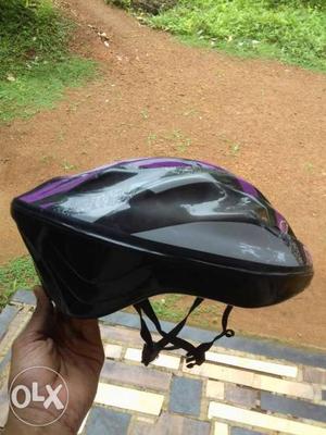 Black And Purple Bike Helmet