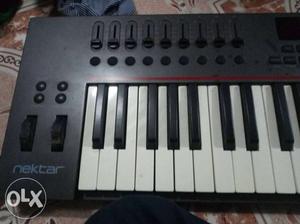 Black And White Nektar Electronic Keyboard